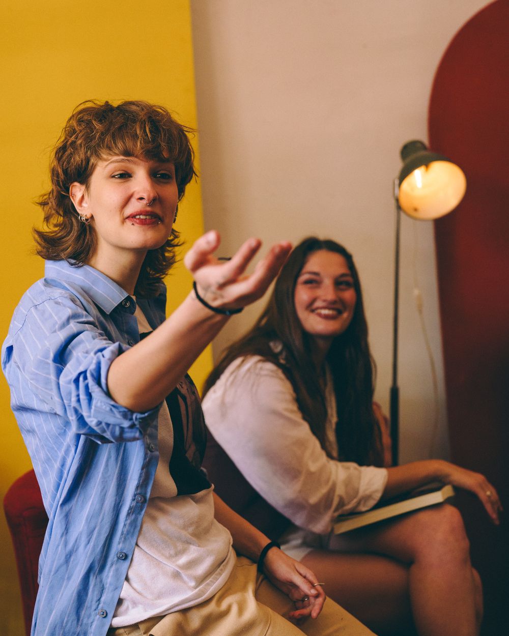 Photograph of two people having a supportive conversation