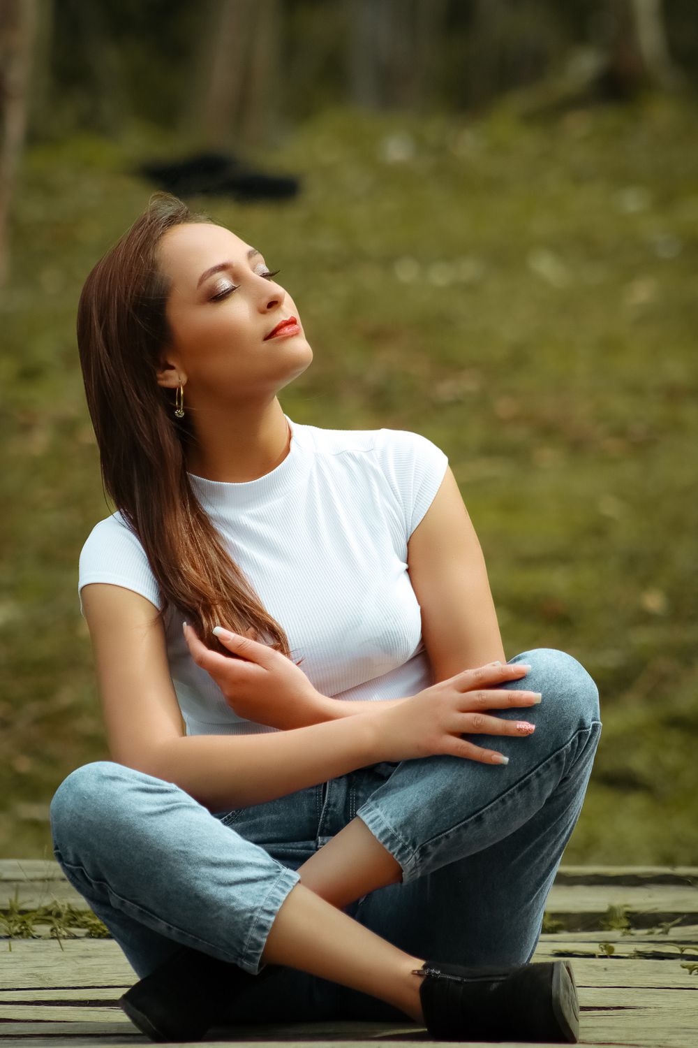 A person practicing calm, mindful breathing outdoors