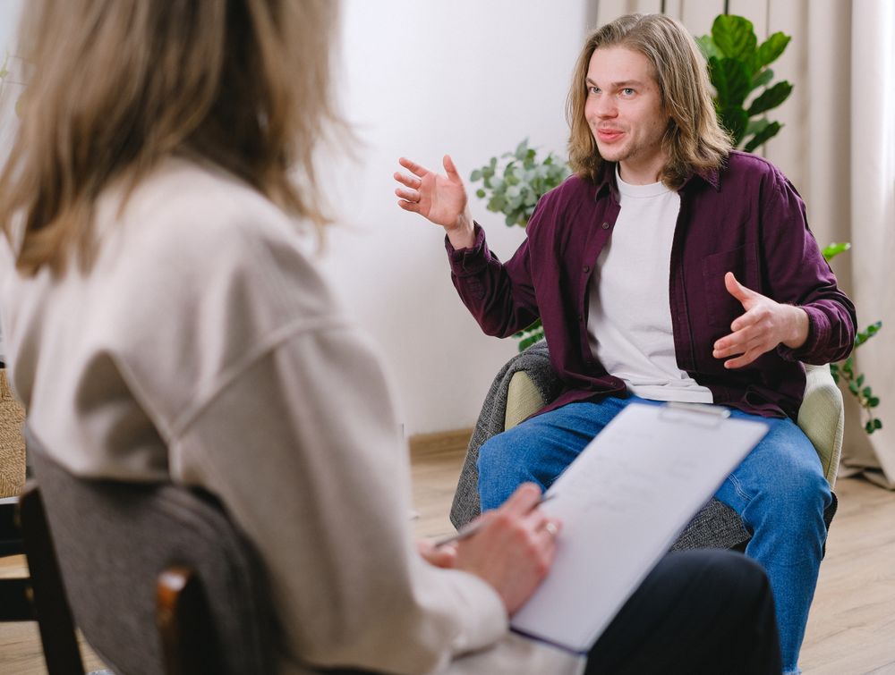 A therapist and client during a one-on-one therapy conversation